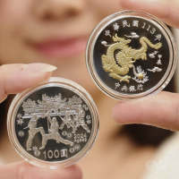 Taiwan central bank unveils coins to mark Year of the Dragon